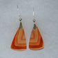 Carnelian Agate & Sterling Silver Earrings.  Indonesian Agates exhibit a wide variety of colors and amazing complexity.  No two agates are exactly alike, each one being a unique and beautiful creation!  Agates with multiple bands of color are known as fortification agates, those with dendritic or moss looking inclusions are referred to as moss agate and many others are given descriptive names relative to their appearance or where they are found. 
