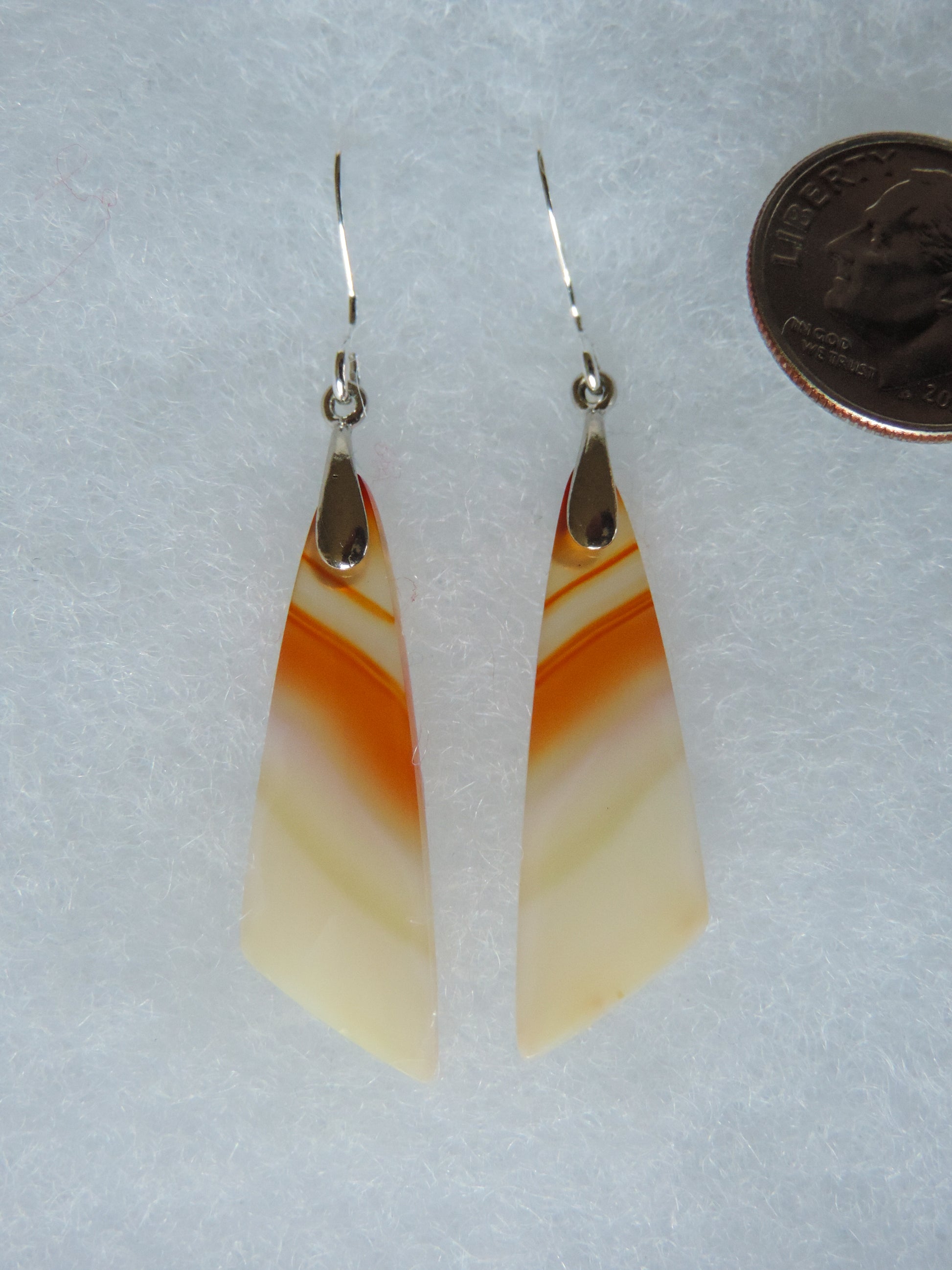 Find your perfect Indonesian Carnelian Agate Earrings on our store!  The bail and earring wire are authentic 925 sterling silver.  This Carnelian