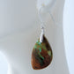 Feel treasured when you wear these Indonesian Blue Opalized Wood Earrings   Our hand crafted jewelry earrings are photographed next to a ruler for size.  This stone is a natural color, no dyes or heat treatment have been used. 