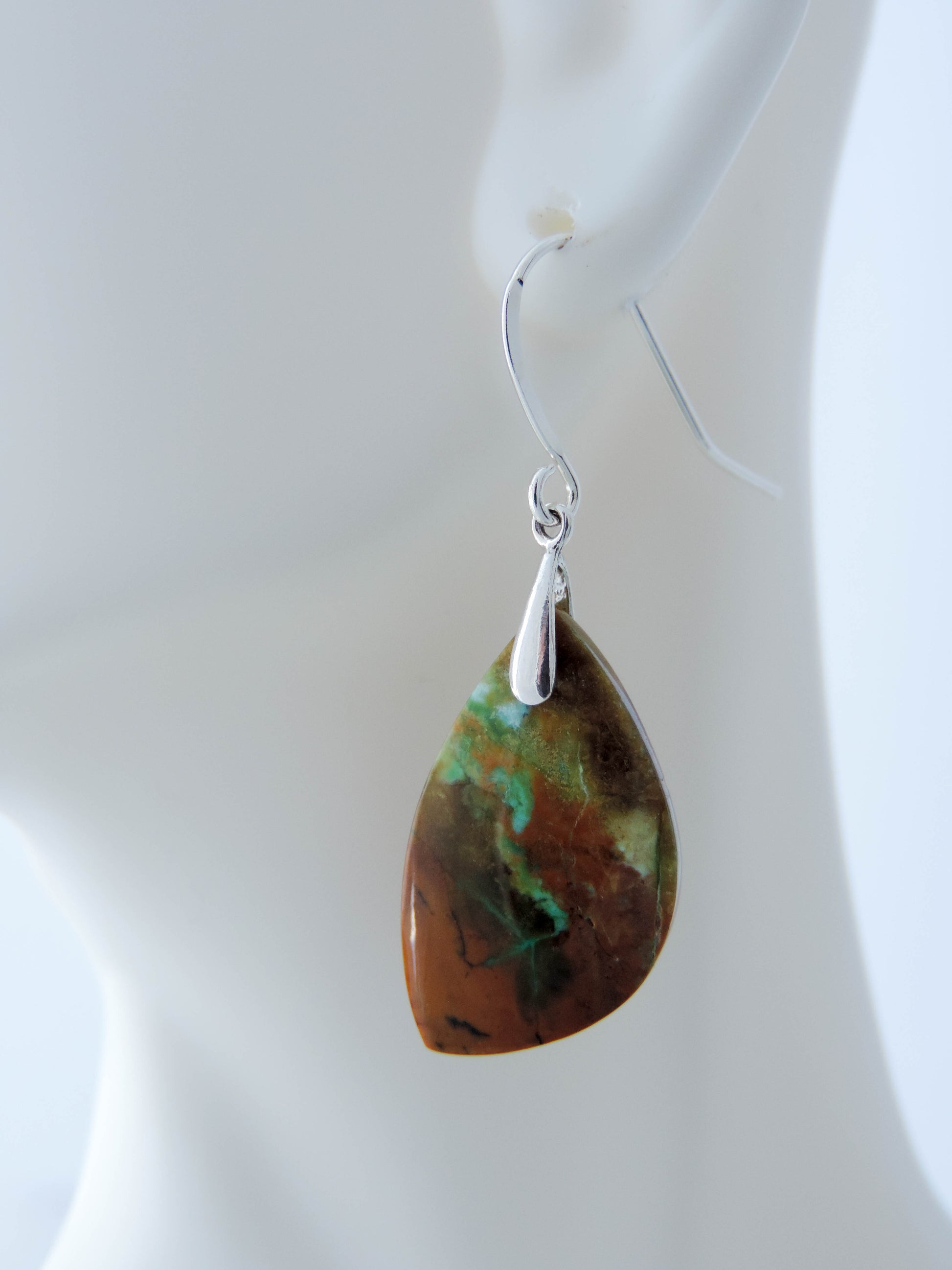 Feel treasured when you wear these Indonesian Blue Opalized Wood Earrings   Our hand crafted jewelry earrings are photographed next to a ruler for size.  This stone is a natural color, no dyes or heat treatment have been used. 