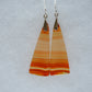 This Carnelian stone is a natural color, no dyes or heat treatment have been used.  It was photographed without filters on automatic setting in natural light; however, slight color variations may occur due to digitization.  Natural stones can have nooks and crannies, inclusions or small cracks, these distinguishing features lend character to the piece.