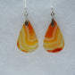 Carnelian Agate & Sterling Silver Earrings.  Indonesian Carnelian Agates exhibit a wide variety of colors and amazing complexity.  No two agates are exactly alike, each one being a unique and beautiful creation!  Agates with multiple bands of color are known as fortification agates, those with dendritic or moss looking inclusions are referred to as moss agate and many others are given descriptive names relative to their appearance or where they are found.  