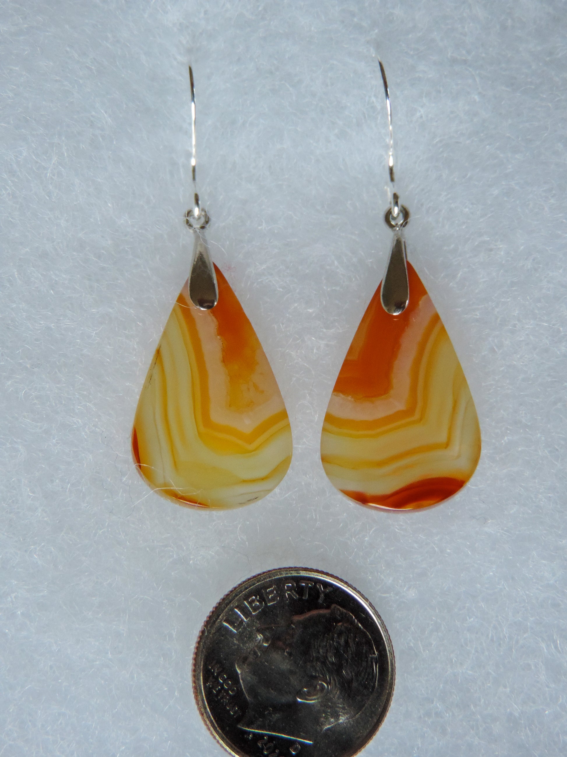 Find your perfect Indonesian Carnelian Agate Earrings on our store!  The bail and earring wire are authentic 925 sterling silver.