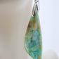 Extremely rare and lovely, Indonesian Blue Opalized Wood is a cherished material used by lapidary artists for creating stunning pieces of jewelry.  The material was first found as pebbles and rounded stones in streams and near the slopes of three volcanoes in the West Java Province.