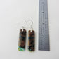 Indonesian Blue Opalized Wood Earrings with Sterling Silver really beautifully hand crafted!! Extremely rare and lovely, Indonesian Blue Opalized Wood is a cherished material used by lapidary artists for creating stunning pieces of jewelry.  The material was first found as pebbles and rounded stones in streams and near the slopes of three volcanoes in the West Java Province.  