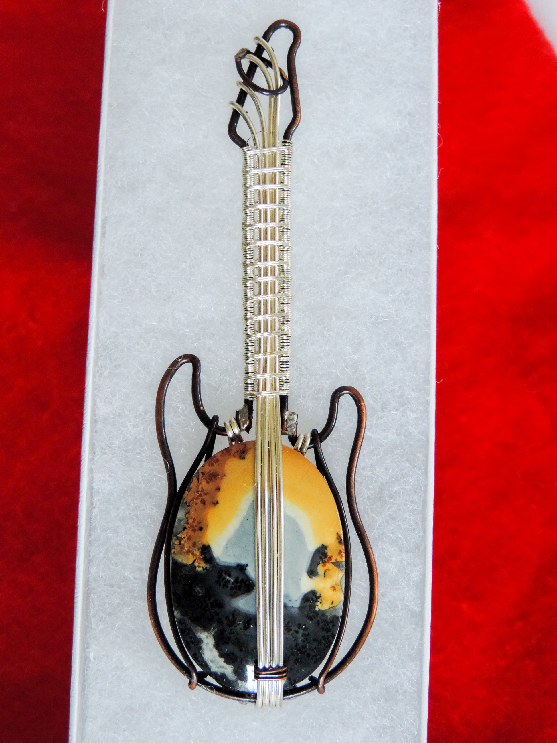 Maligano Jasper and Mixed Metals Guitar Pendant  One of a kind pendant that shows off your unique taste!