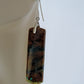 Indonesian Blue Opalized Wood Earrings with Sterling Silver, beautiful jewelry!!Extremely rare and lovely, Indonesian Blue Opalized Wood is a cherished material used by lapidary artists for creating stunning pieces of jewelry.  The material was first found as pebbles and rounded stones in streams and near the slopes of three volcanoes in the West Java Province.  