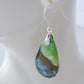 Extremely rare and lovely, Indonesian Blue Opalized Wood is a cherished material used by lapidary artists for creating stunning pieces of jewelry.  The material was first found as pebbles and rounded stones in streams and near the slopes of three volcanoes in the West Java Province.  The bail and earring wires are authentic 925 sterling silver.  Feel treasured when you wear these earrings!