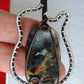 Bloodstone and Mixed Metals Guitar Pendant.  Bloodstone and Mixed Metals  One of a kind guitar pendant that shows off your unique taste!