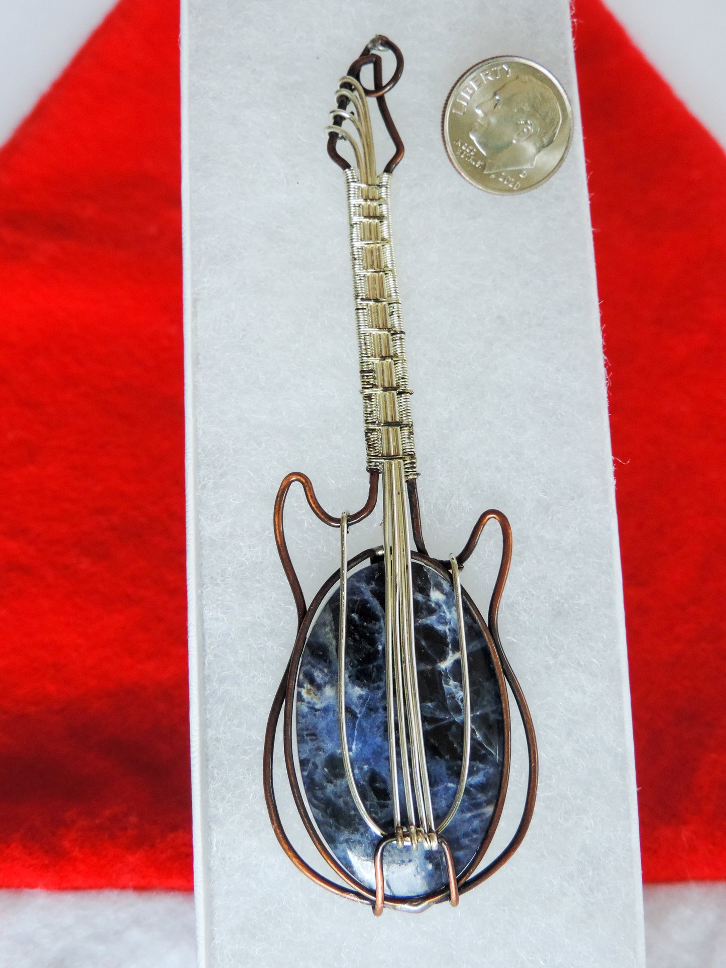 Semi-precious Gemstone and Mixed Metals Guitar Pendant.  Semi-precious Gemstone and Mixed Metals  One of a kind pendant that shows off your unique taste!