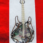 Moss Agate and Mixed Metals Guitar Pendant.  Moss Agate and Mixed Metals  One of a kind pendant that shows off your unique taste!