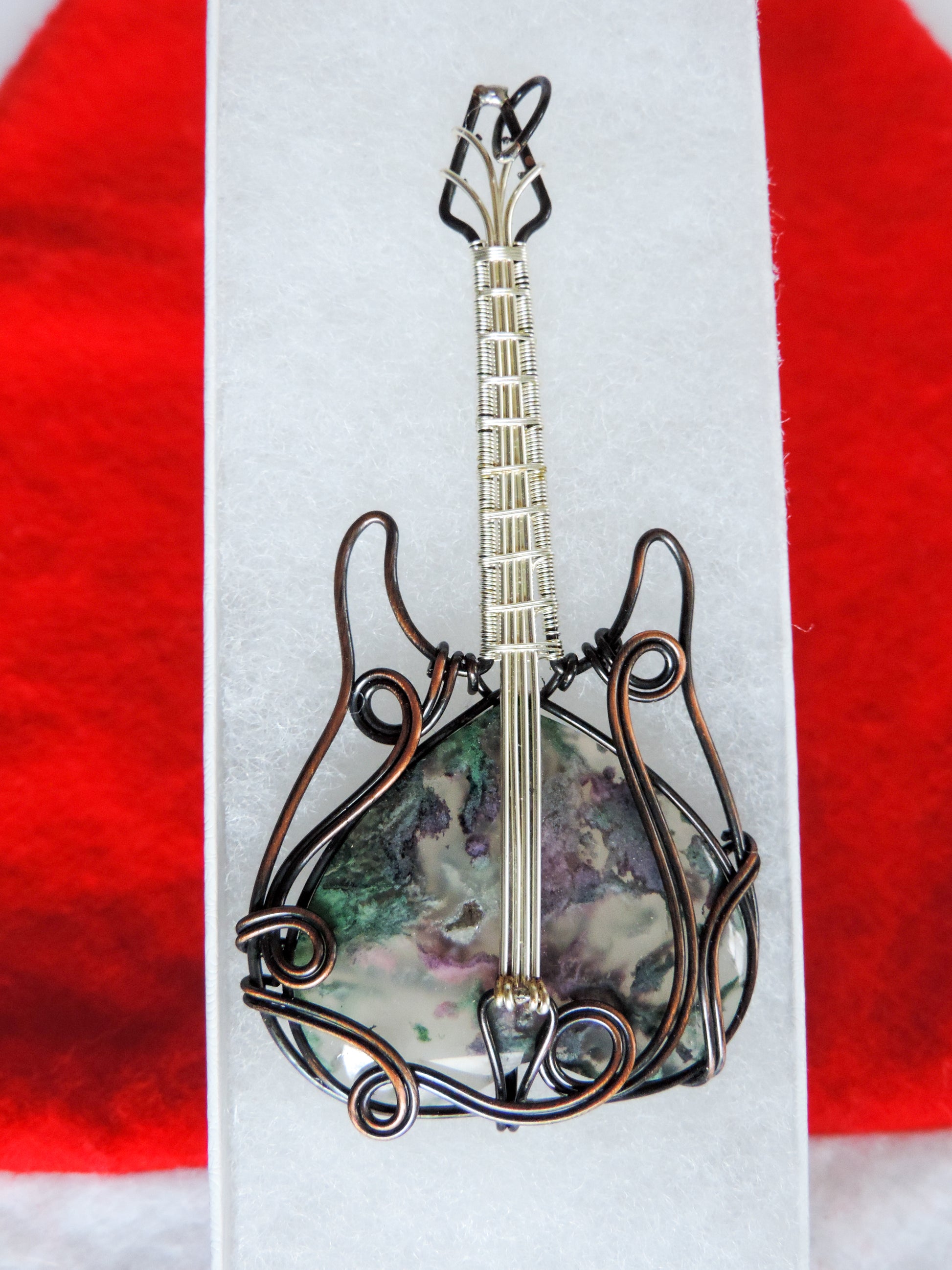 Moss Agate and Mixed Metals Guitar Pendant.  Moss Agate and Mixed Metals  One of a kind pendant that shows off your unique taste!