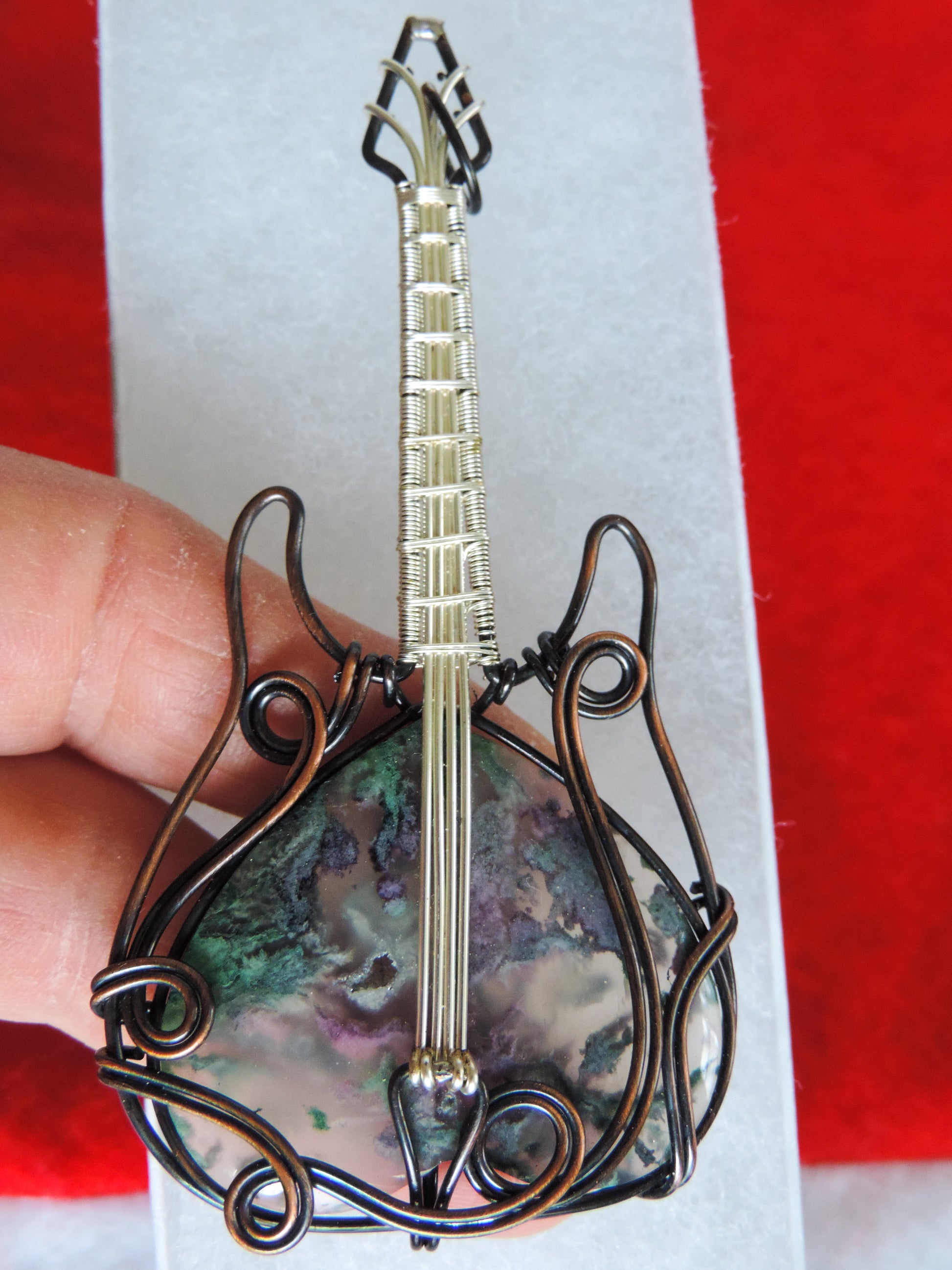 Moss Agate and Mixed Metals Guitar Pendant.  Moss Agate and Mixed Metals  One of a kind pendant that shows off your unique taste!