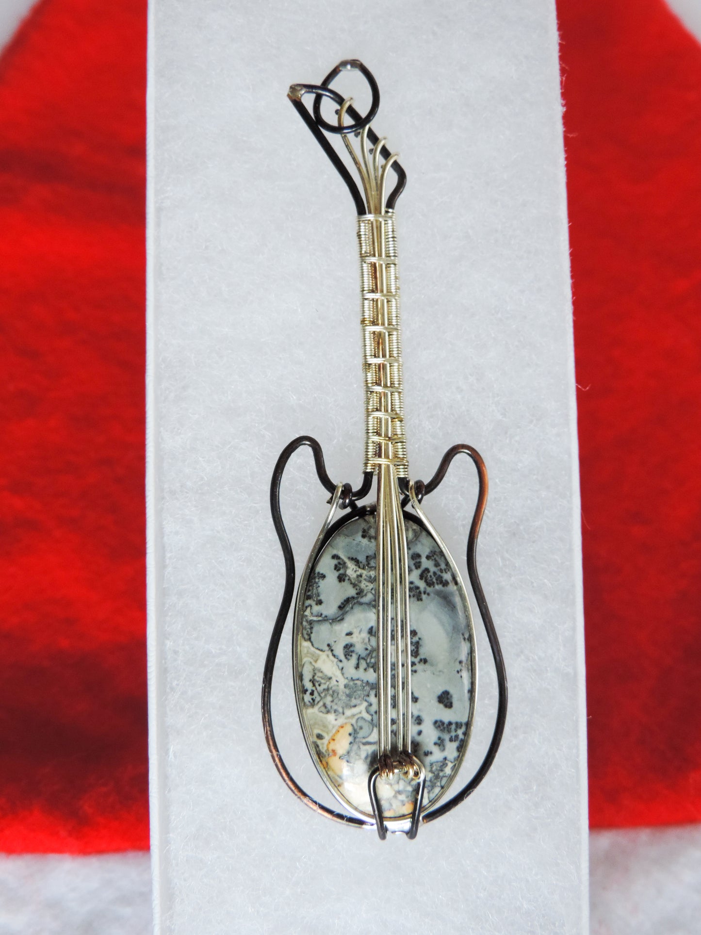 Moss Agate and Mixed Metals Guitar Pendant.  Moss Agate and Mixed Metals  One of a kind pendant that shows off your unique taste!