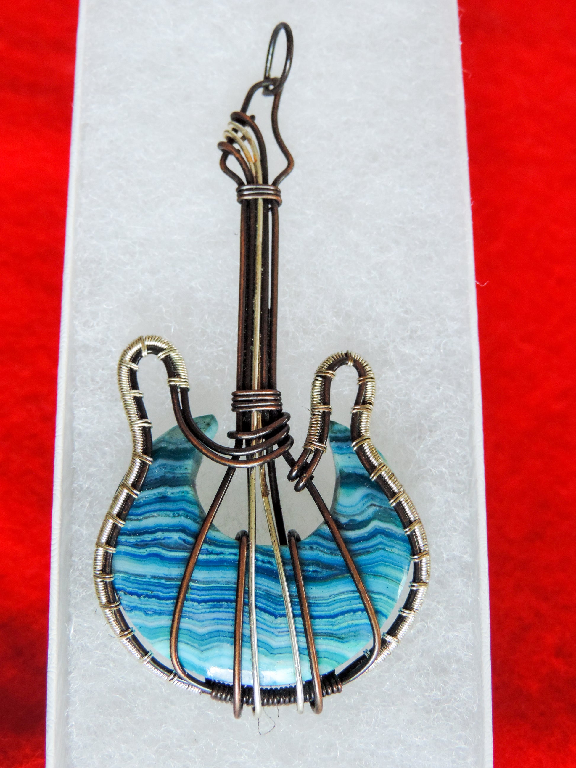 Lace Agate and Mixed Metals Guitar Pendant.  Lace Agate and Mixed Metals  One of a kind pendant that shows off your unique taste!