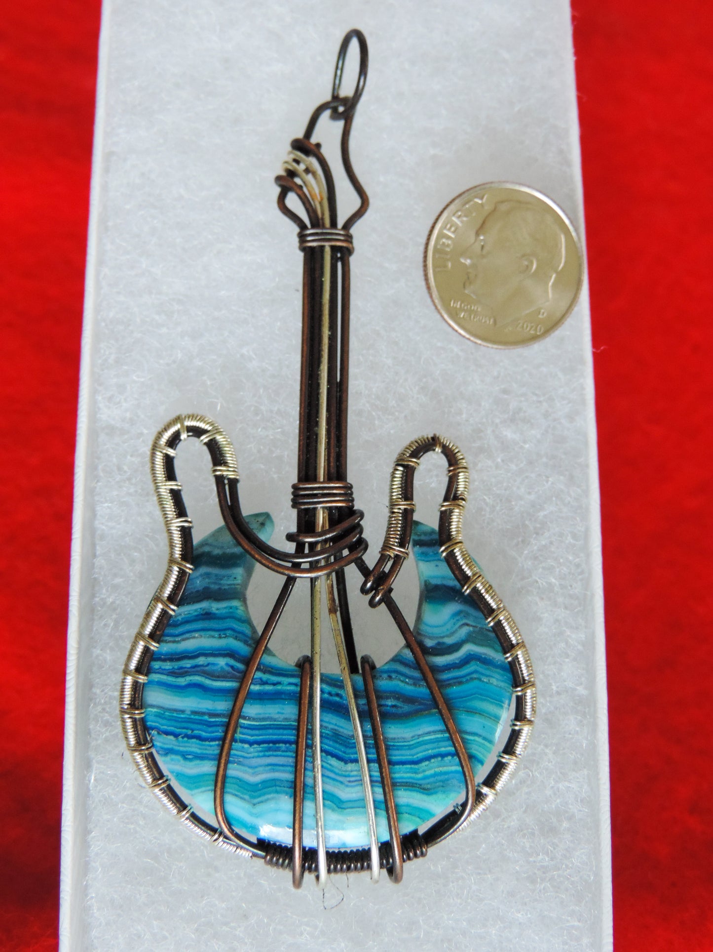 Lace Agate and Mixed Metals Guitar Pendant.  Lace Agate and Mixed Metals  One of a kind pendant that shows off your unique taste!