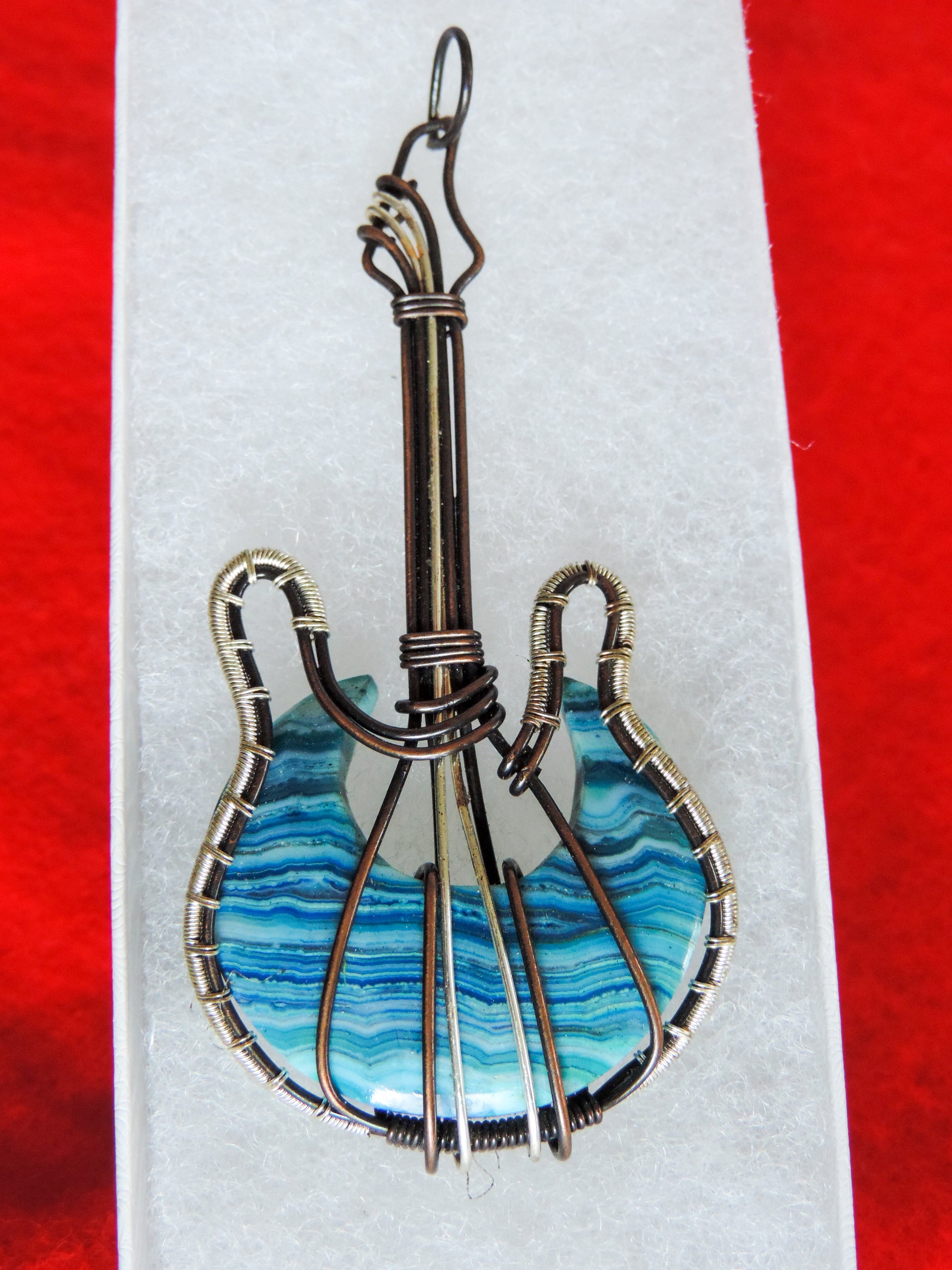 Lace Agate and Mixed Metals Guitar Pendant.  Lace Agate and Mixed Metals  One of a kind pendant that shows off your unique taste!