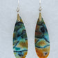 Indonesian Blue Opalized Wood & Sterling Silver Earrings.  Feel treasured when you wear these earrings!  Extremely rare and lovely, Indonesian Blue Opalized Wood is a cherished material used by lapidary artists for creating stunning pieces of jewelry.  The material was first found as pebbles and rounded stones in streams and near the slopes of three volcanoes in the West Java Province.  