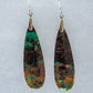 These rich minerals are responsible for the amazing colors in the stone.  The bail and earring wires are authentic 925 sterling silver.