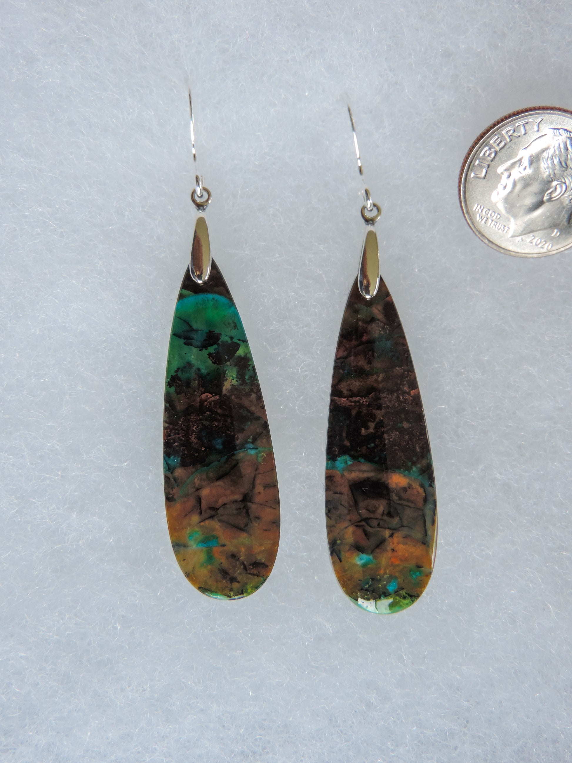 Your Blue Opalized Wood Earrings will be shipped the same day in most cases, Monday through Friday.  Orders will be shipped first class USPS, which takes 3-4 days in the U.S. for delivery.  If your jewelry earrings arrive damaged or you are dissatisfied, please contact us upon receipt of item.