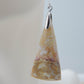 Our hand crafted jewelry earrings are photographed next to a ruler for size.  This stone is a natural color, no dyes or heat treatment have been used.  It was photographed without filters on automatic setting in natural light; however, slight color variations may occur due to digitization.  Natural stones can have nooks and crannies, inclusions or small cracks, these