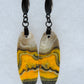 Bumblebee Jasper is named for its yellow, white, orange and black colored banding which resembles a common bumblebee.  This mineral was discovered in the Papandayan Volcano, West Java Province, Indonesia.  The gemstone is truly unique in appearance, fun to wear and is known spiritually for its uplifting, radiant energy. 