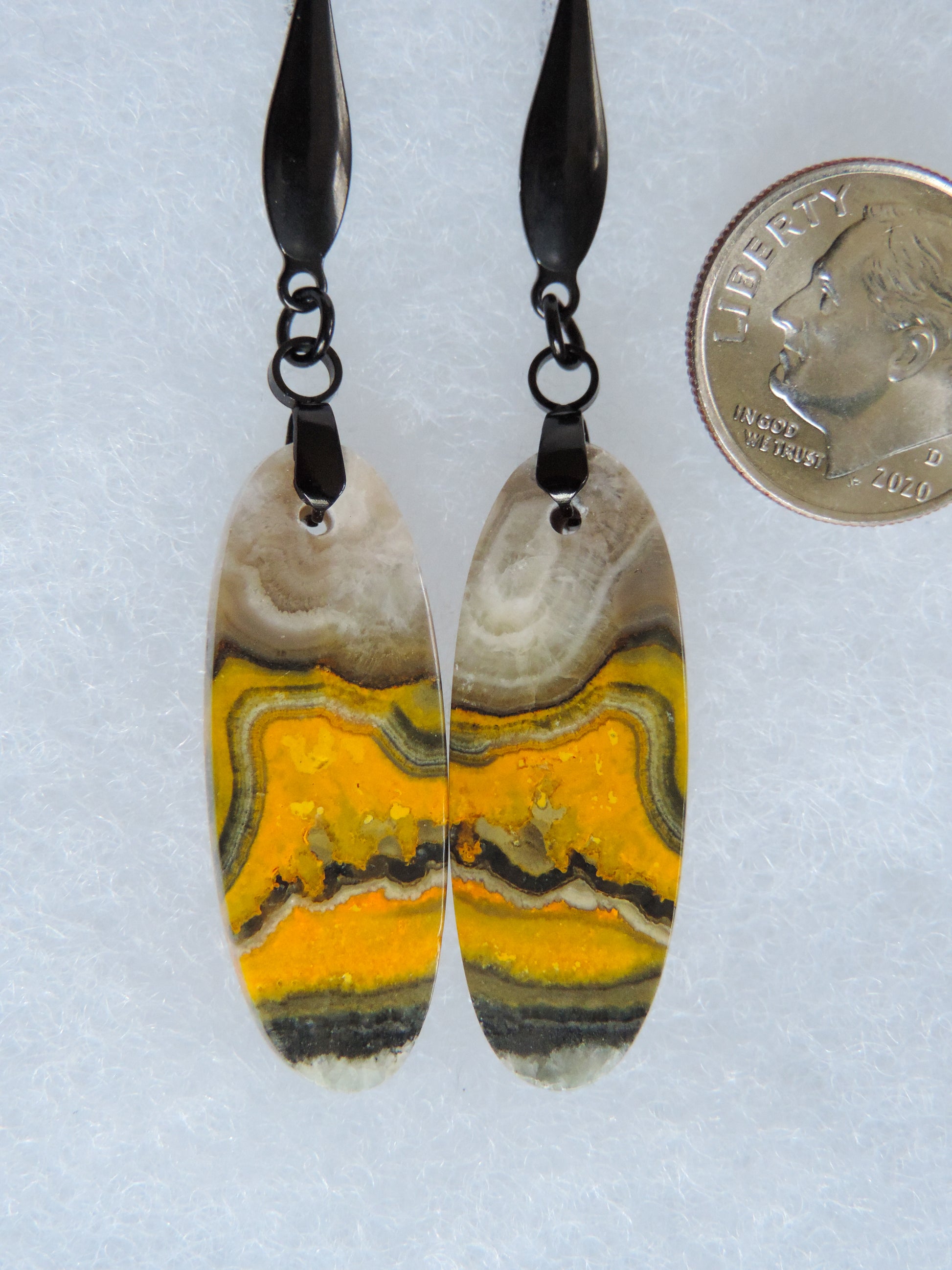 Bee the buzz when you wear these fun Bumblebee Jasper Earrings!  Bumblebee Jasper is named for its yellow, white, orange and black colored banding which resembles a common bumblebee.  This mineral was discovered in the Papandayan Volcano, West Java Province, Indonesia. 