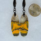 Bumblebee Jasper is named for its yellow, white, orange and black colored banding which resembles a common bumblebee.  This mineral was discovered in the Papandayan Volcano, West Java Province, Indonesia.  The gemstone is truly unique in appearance, fun to wear and is known spiritually for its uplifting, radiant energy. 