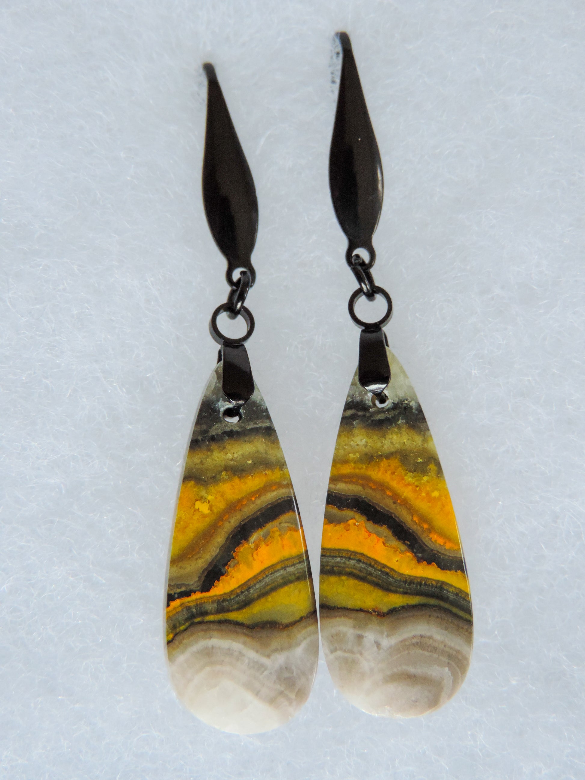 Bee the buzz when you wear these fun Bumblebee Jasper Earrings!  Bumblebee Jasper is named for its yellow, white, orange and black colored banding which resembles a common bumblebee.  This mineral was discovered in the