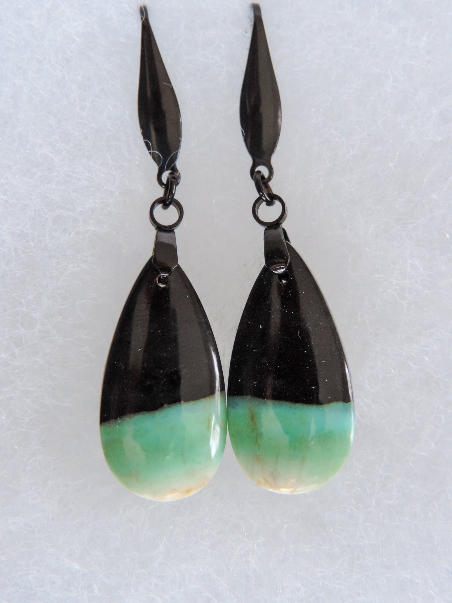 Feel treasured when you wear these Indonesian Blue Opalized Wood Earrings!