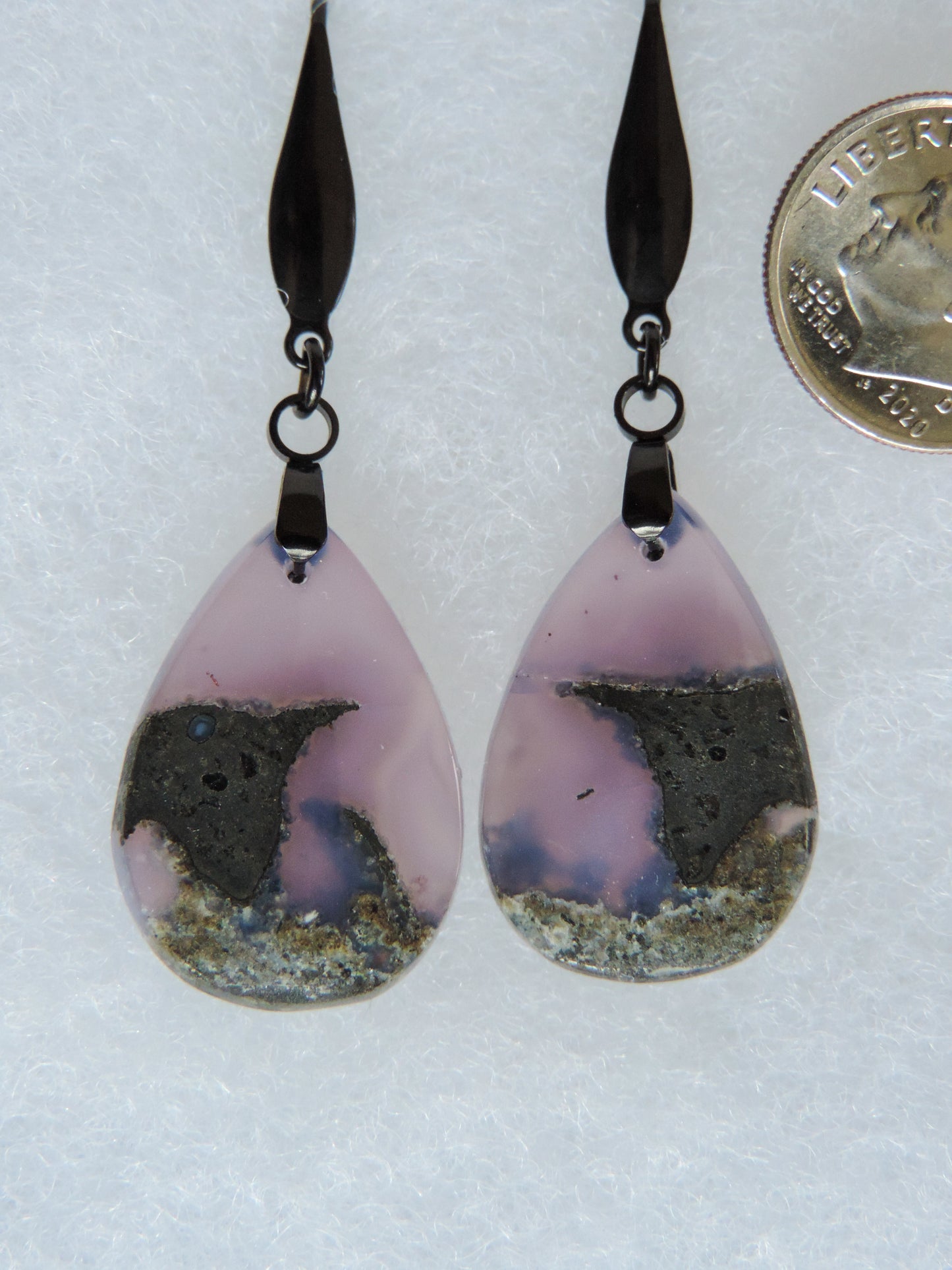 Wear some purple today!  This stone is a natural color, no dyes or heat treatment have been used.  It was photographed without filters in natural light; however, slight color variations may occur due to digitization.  Natural stones can have nooks and crannies, inclusions or small cracks, these distinguishing features lend character to the piece.