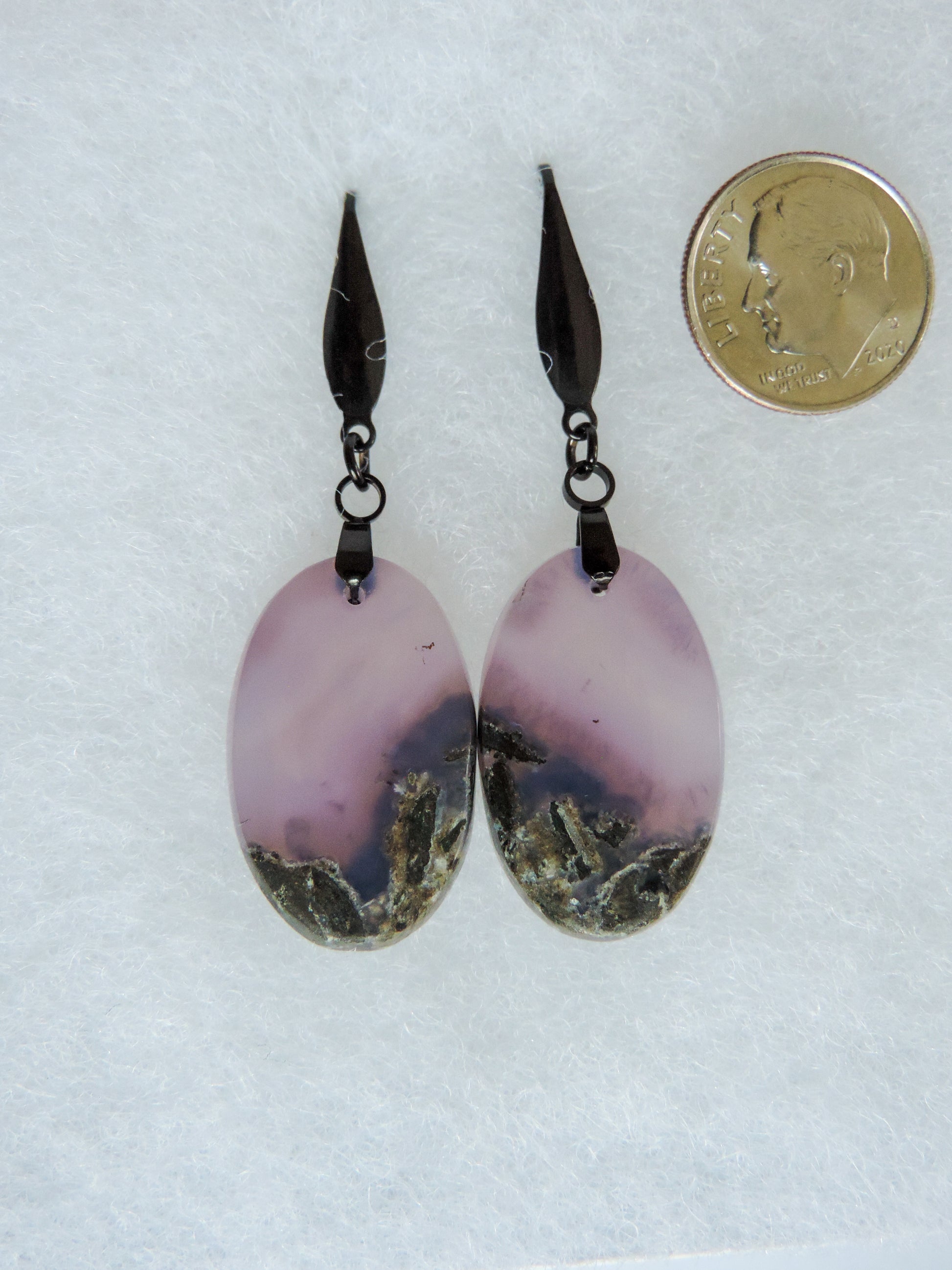 Wear some purple today!  This stone is a natural color, no dyes or heat treatment have been used.  It was photographed without filters in natural light; however, slight color variations may occur due to digitization.  Natural stones can have nooks and crannies, inclusions or small cracks, these distinguishing features lend character to the piece.