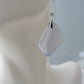 The bail and earring wires are authentic 925 sterling silver.  Wear these original earrings and stand out in a crowd!  Known as the Treasure State, Montana’s landscape is an abundant resource for precious and semi-precious stones.  One of the semi-precious stones, Madison Blue Agate, are featured in these earrings.  