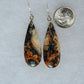 This stone is a natural color, no dyes or heat treatment have been used.  It was photographed without filters natural light; however, slight color variations may occur due to digitization.  Natural stones can have nooks and crannies, inclusions or small cracks, these distinguishing features lend character to the piece.