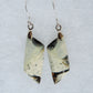 This stone is a natural color, no dyes or heat treatment have been used.  It was photographed without filters natural light; however, slight color variations may occur due to digitization.  Natural stones can have nooks and crannies, inclusions or small cracks, these distinguishing features lend character to the piece.