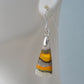 Bumblebee Jasper is named for its yellow, white, orange and black colored banding which resembles a common bumblebee.  This mineral was discovered in the Papandayan Volcano, West Java Province, Indonesia.  The gemstone is truly unique in appearance, fun to wear and is known spiritually for its uplifting, radiant energy.  Bee the buzz when you wear these fun earrings!  The bail and earring wire are authentic 925 sterling silver.