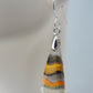 Bumblebee Jasper is named for its yellow, white, orange and black colored banding which resembles a common bumblebee.  This mineral was discovered in the Papandayan Volcano, West Java Province, Indonesia.  The gemstone is truly unique in appearance, fun to wear and is known spiritually for its uplifting, radiant energy.  Bee the buzz when you wear these fun earrings!  The bail and earring wire are authentic 925 sterling silver.