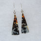 Found roughly ten years ago, this stone has made its way into the main stream market.  The bail and earring wires are authentic 925 sterling silver.