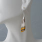 Bumblebee Jasper is named for its yellow, white, orange and black colored banding which resembles a common bumblebee.  This mineral was discovered in the Papandayan Volcano, West Java Province, Indonesia.  The gemstone is truly unique in appearance, fun to wear and is known spiritually for its uplifting, radiant energy.  Bee the buzz when you wear these fun earrings!  The bail and earring wire are authentic 925 sterling silver.