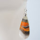 Bumblebee Jasper is named for its yellow, white, orange and black colored banding which resembles a common bumblebee.  This mineral was discovered in the Papandayan Volcano, West Java Province, Indonesia.  The gemstone is truly unique in appearance, fun to wear and is known spiritually for its uplifting, radiant energy.  Bee the buzz when you wear these fun earrings!  The bail and earring wire are authentic 925 sterling silver.
