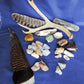 Yellowstone Country Treasure Sampler.  Natural earth items in this sampler package include:  1 antler, $36.99  2 polished petrified wood, $4.00  4 crystals, $2.00  10 assorted sizes polished madison blue agate, $20.00  3 rough petrified wood, $8.00  1 rough madison blue agate, $2.00  1 polished jasper, $2.00  2 madison blue agate key chains, $13.98  2 worry stones, $8.00  2 turkey feathers, $4.00  Total Value... $100.97  Holiday Sale Price - $59.99 (40% off)