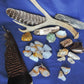 Yellowstone Country Treasure Sampler.  Natural earth items in this sampler package include:  1 antler, $36.99  2 polished petrified wood, $4.00  4 crystals, $2.00  10 assorted sizes polished madison blue agate, $20.00  3 rough petrified wood, $8.00  1 rough madison blue agate, $2.00  1 polished jasper, $2.00  2 madison blue agate key chains, $13.98  2 worry stones, $8.00  2 turkey feathers, $4.00  Total Value... $100.97  Holiday Sale Price - $59.99 (40% off