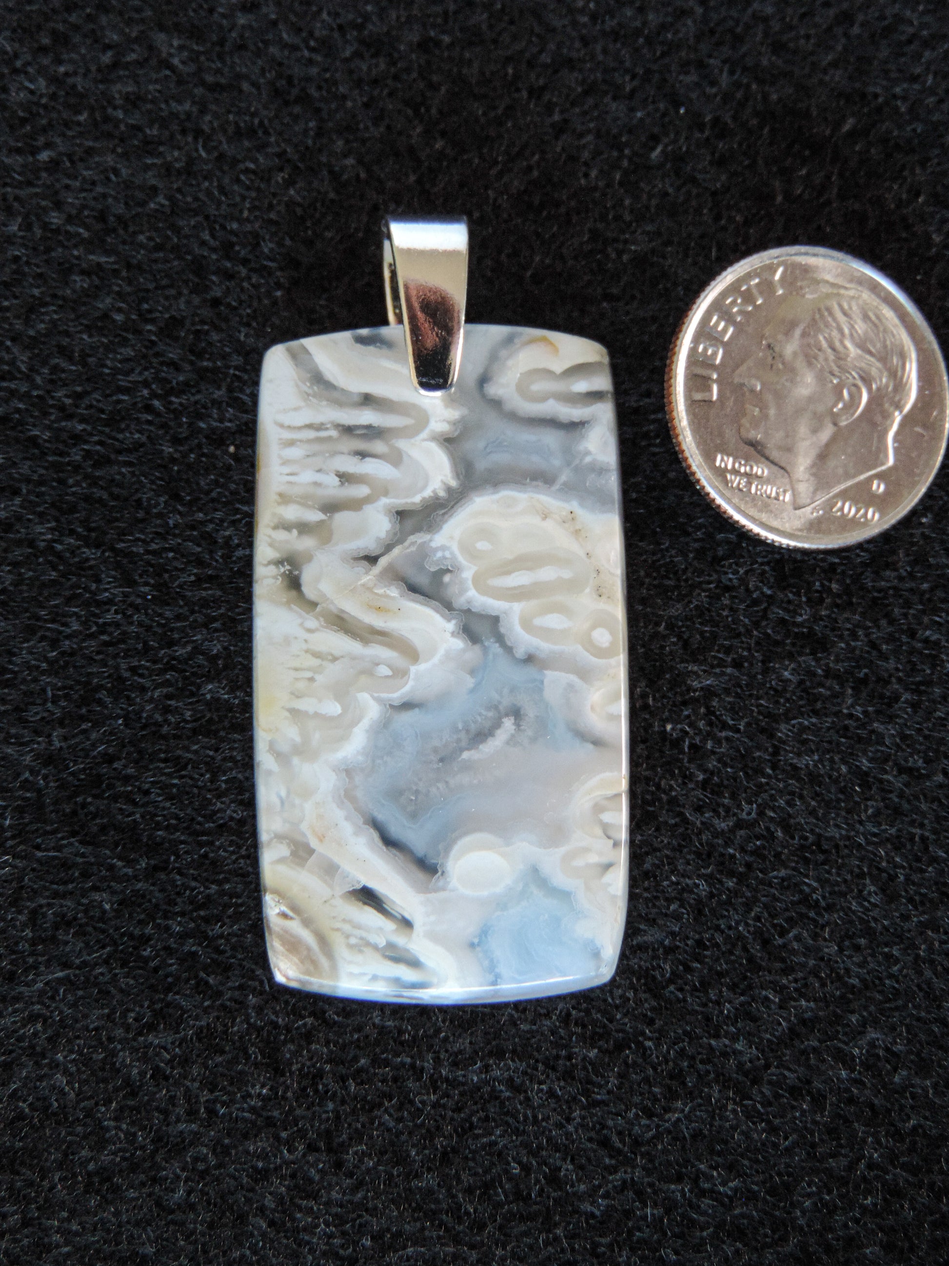 This stone is a natural color, no dyes or heat treatment have been used.  It was photographed without filters in natural light; however, slight color variations may occur due to digitization.  Natural stones can have nooks and crannies, inclusions or small cracks, these distinguishing features lend character to the piece.