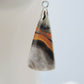 Bumblebee Jasper is named for its yellow, white, orange and black colored banding which resembles a common bumblebee.  This mineral was discovered in the Papandayan Volcano, West Java Province, Indonesia.  The gemstone is truly unique in appearance, fun to wear and is known spiritually for its uplifting, radiant energy.  Bee the buzz when you wear these fun earrings!  The bail and earring wire are authentic 925 sterling silver.