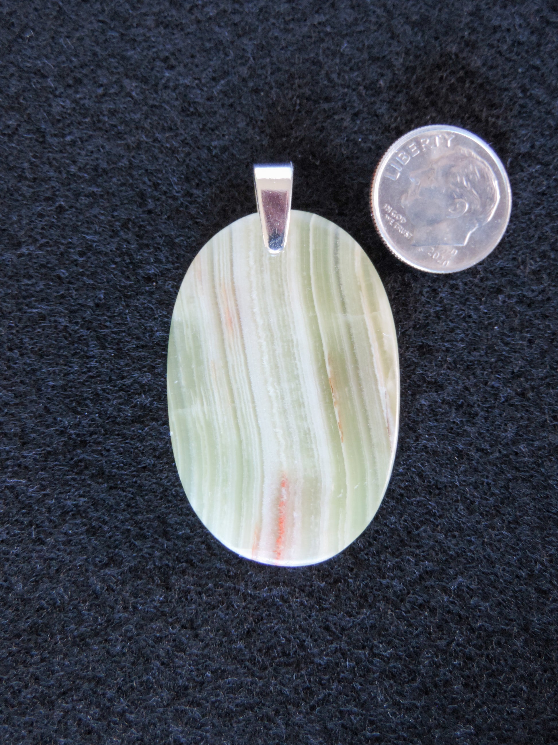 Find your perfect Indonesian Agate on our store!  The pendant bail is authentic 925 sterling silver.