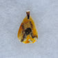 This stone is a natural color, no dyes or heat treatment have been used.  It was photographed without filters in natural light; however, slight color variations may occur due to digitization.  Natural stones can have nooks and crannies, inclusions or small cracks, these distinguishing features lend character to the piece.