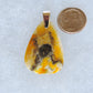 The pendant bail is authentic 925 sterling silver.  This stone is a natural color, no dyes or heat treatment have been used.  It was photographed without filters in natural light; however, slight color variations may occur due to digitization.  Natural stones can have nooks and crannies, inclusions or small cracks, these distinguishing features lend character to the piece.