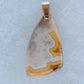 Brown Lace Agate Pendant  Indonesian Agates exhibit a wide variety of colors and amazing complexity.  No two agates are exactly alike, each one being a unique and beautiful creation!  Agates with multiple bands of color are known as fortification agates, those with dendritic or moss looking inclusions are referred to as moss agate and many others are given descriptive names relative to their appearance or where they are found.  The diversity and complexity of 