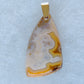 Find your perfect Indonesian Agate on our store!  The pendant bail is authentic 925 sterling silver.