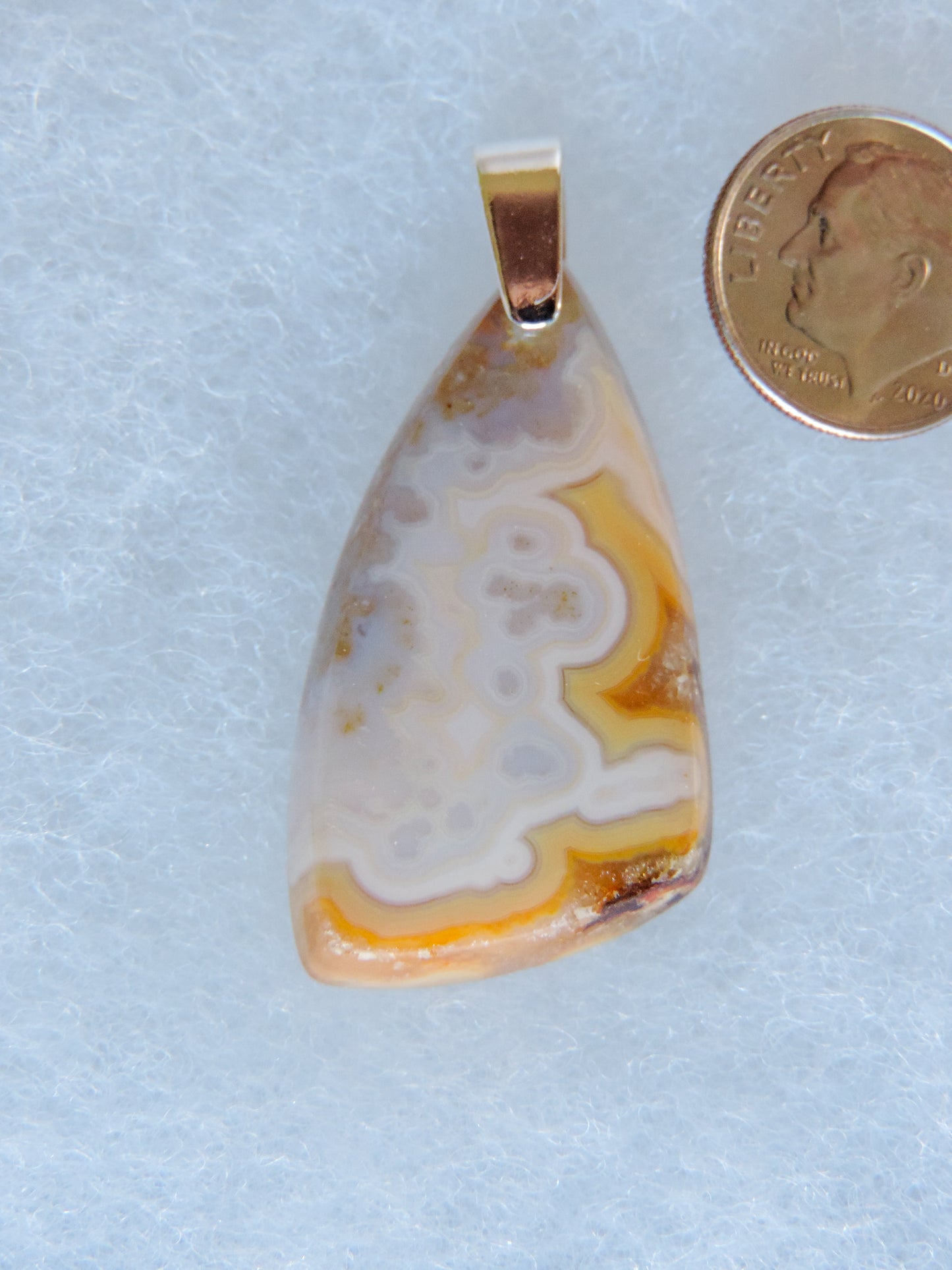 The diversity and complexity of Indonesian agates suggests their genesis occurred over great geological time periods during which a variety of formation conditions existed.  Find your perfect Indonesian Agate on our store!  The pendant bail is authentic 925 sterling silver.